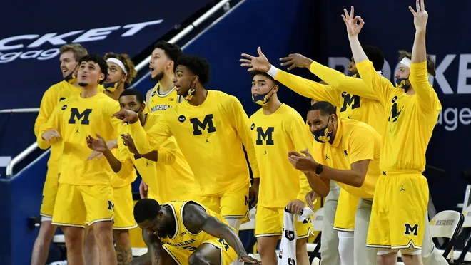 Michigan Wolverine Basketball Players Cheering