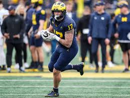 Football Player Running on the Field